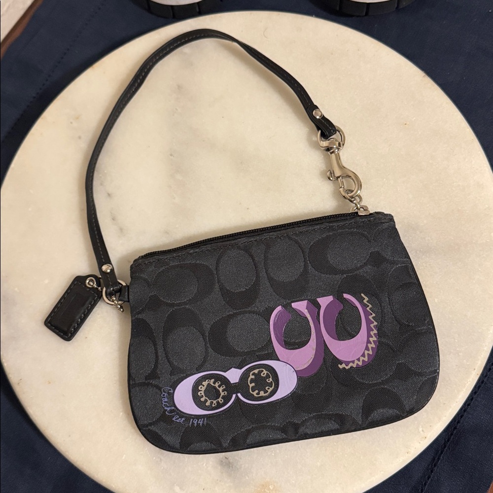 Coach Black and Purple Signature Wristlet 
NWOT